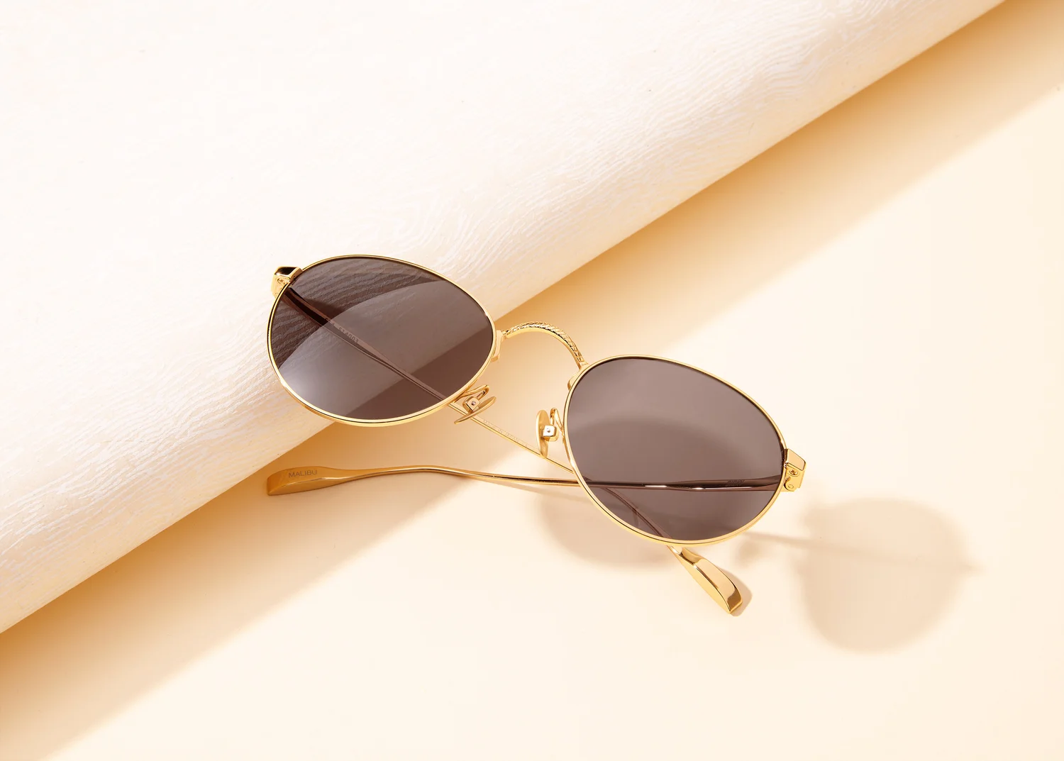 Gold oval sunglasses