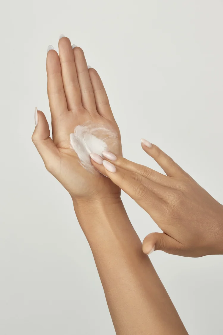 Applying lotion to hands