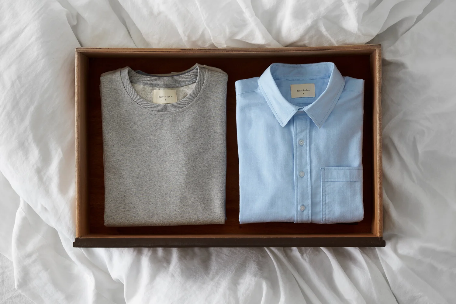 Basic Rights sweatshirt and shirt in tray