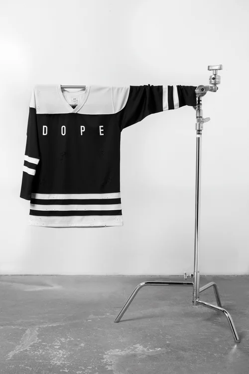 DOPE jersey on a c-stand